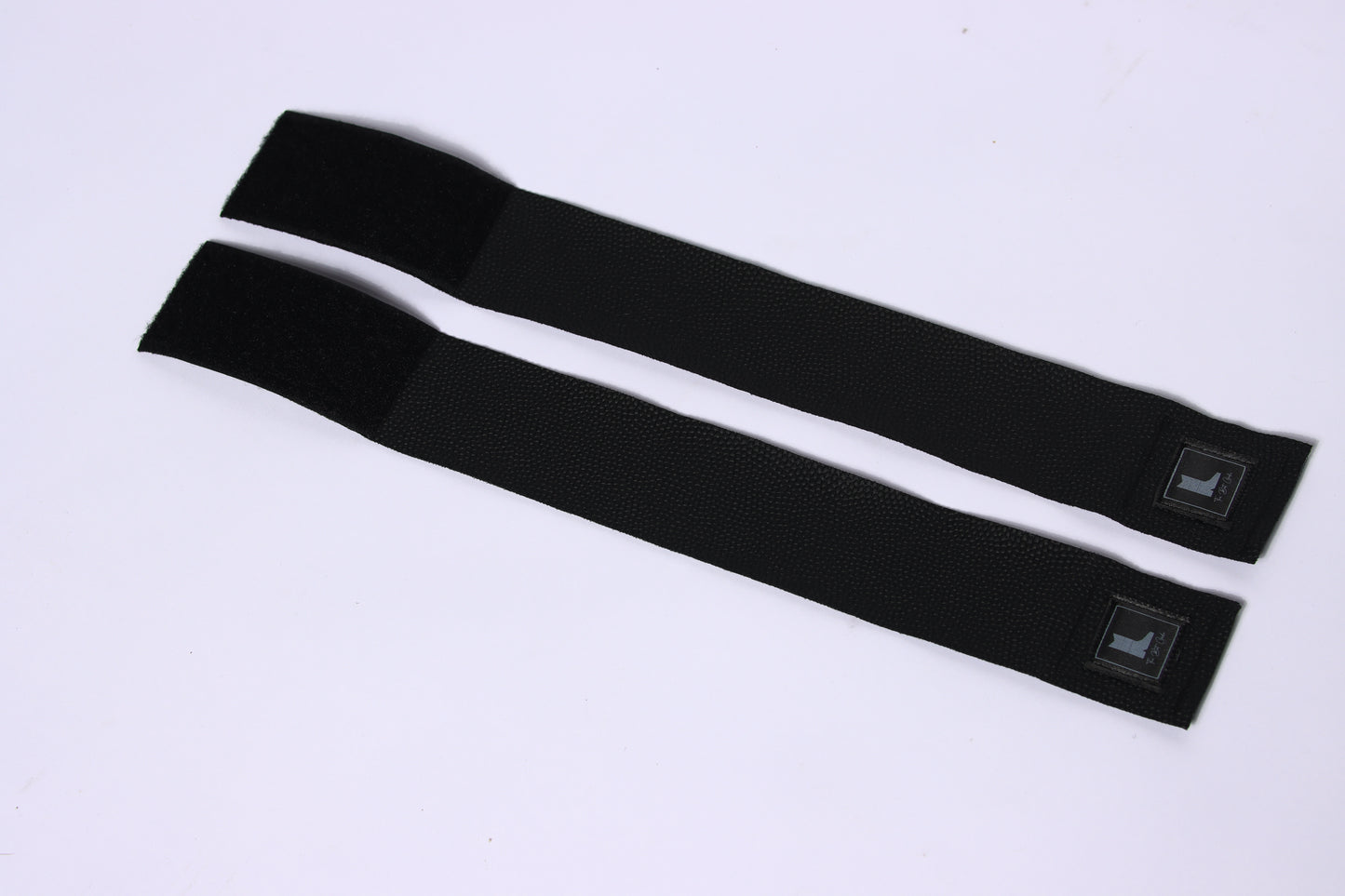 The Boot Girdle compression strap for cowboy boots - Two black boot girdle straps with adjustable Velcro closure, designed to keep your boot shafts hidden in any style of pants